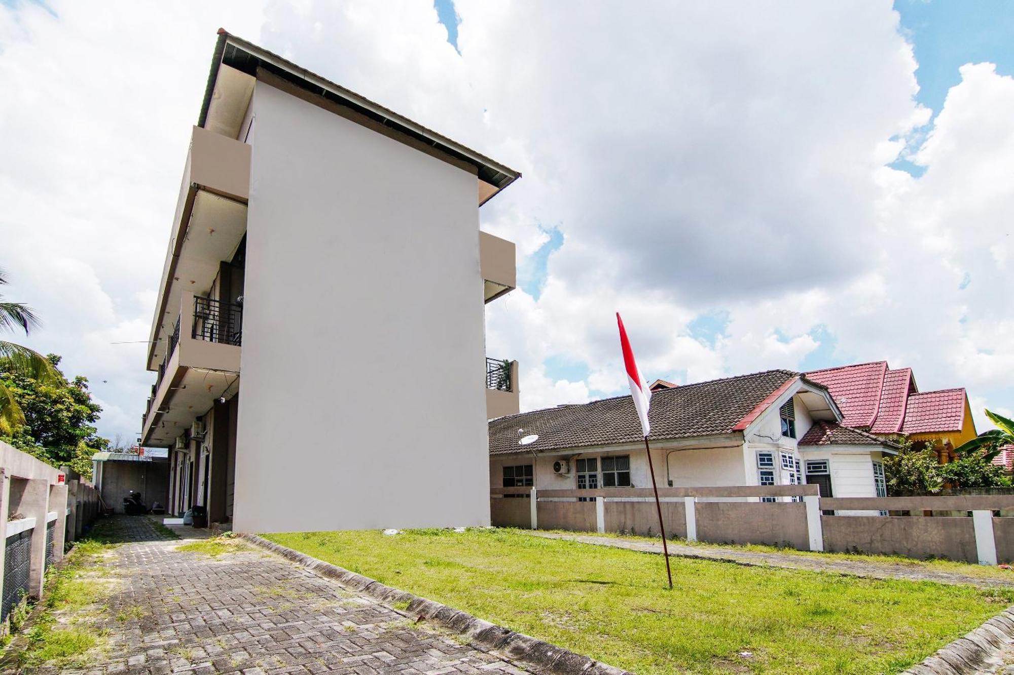 Hotel Spot On 91598 Oklahoma Syariah Pekanbaru