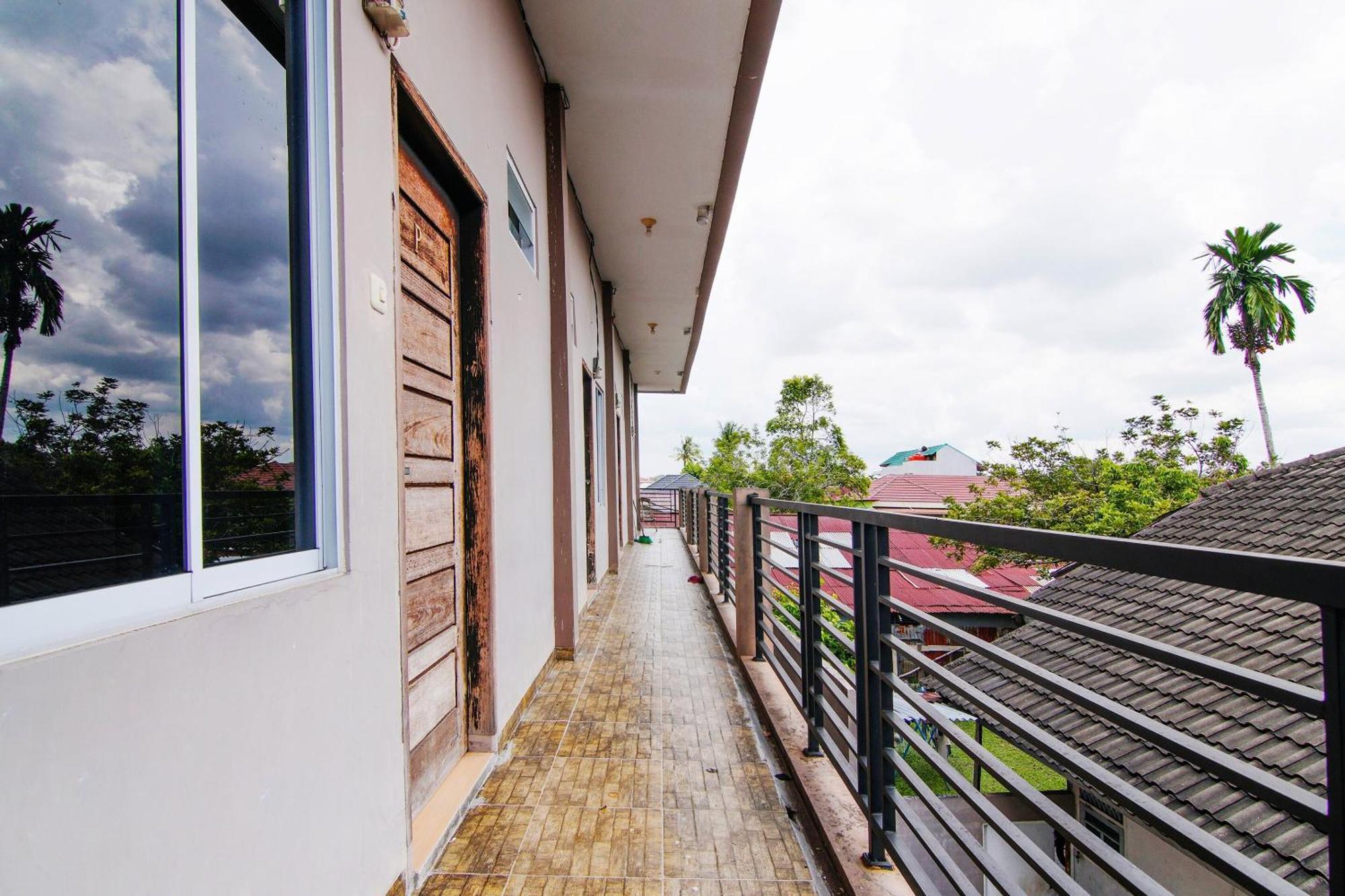 Hotel Spot On 91598 Oklahoma Syariah Pekanbaru